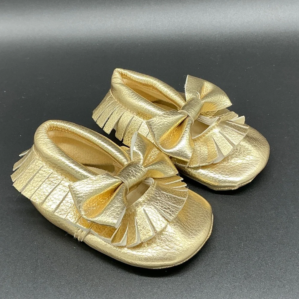 Romirus Metallic Gold Bow Fringe Moccasins